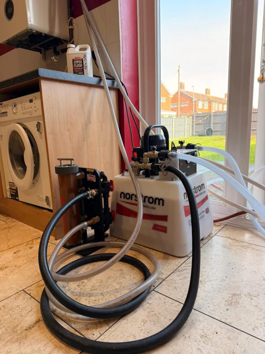 Norstrom ProFlush power flushing equipment set up for a central heating flush in a home in Aylesbury